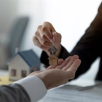 close-up-hand-of-home-apartment-agent-or-realtor-w-2023-11-27-04-52-06-utc.jpg