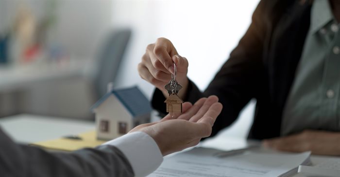 close-up-hand-of-home-apartment-agent-or-realtor-w-2023-11-27-04-52-06-utc.jpg