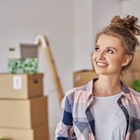 smiling-woman-in-new-home-2023-11-27-05-32-36-utc.jpg